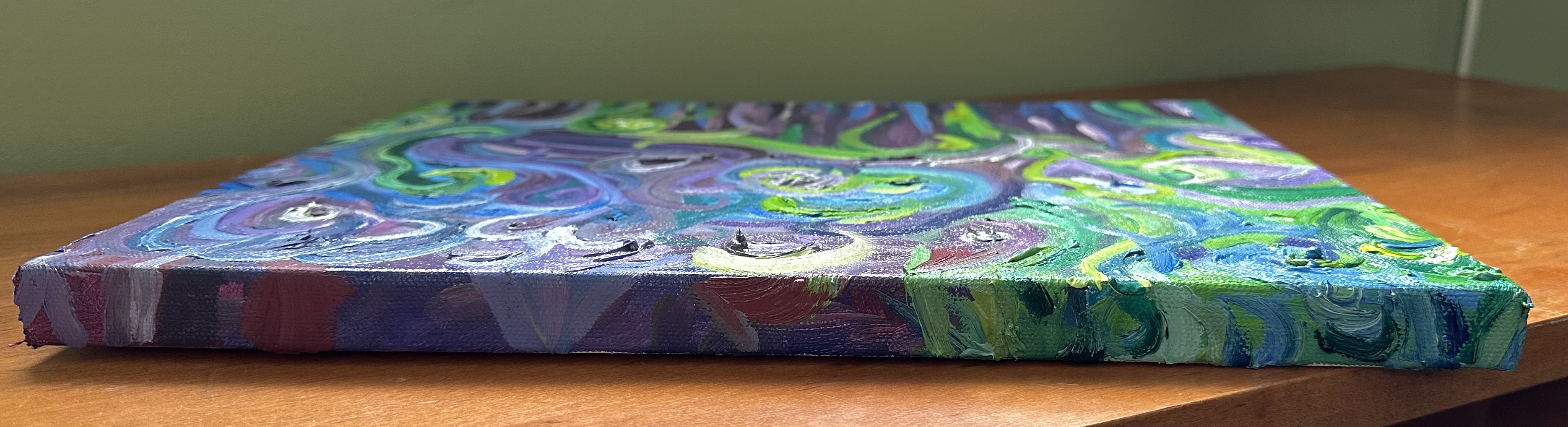 The top - lines and swirls of green, purple, blue, and white.