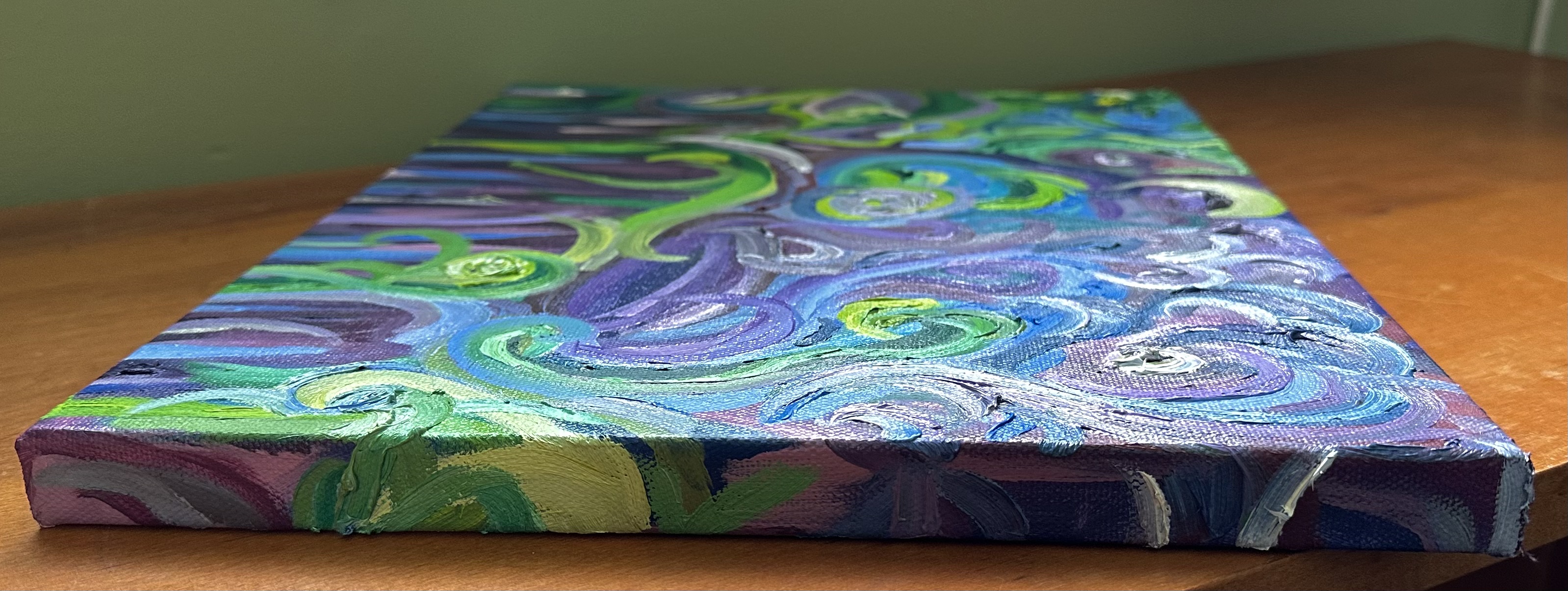 The right - lines and swirls of green, purple, blue, and white.