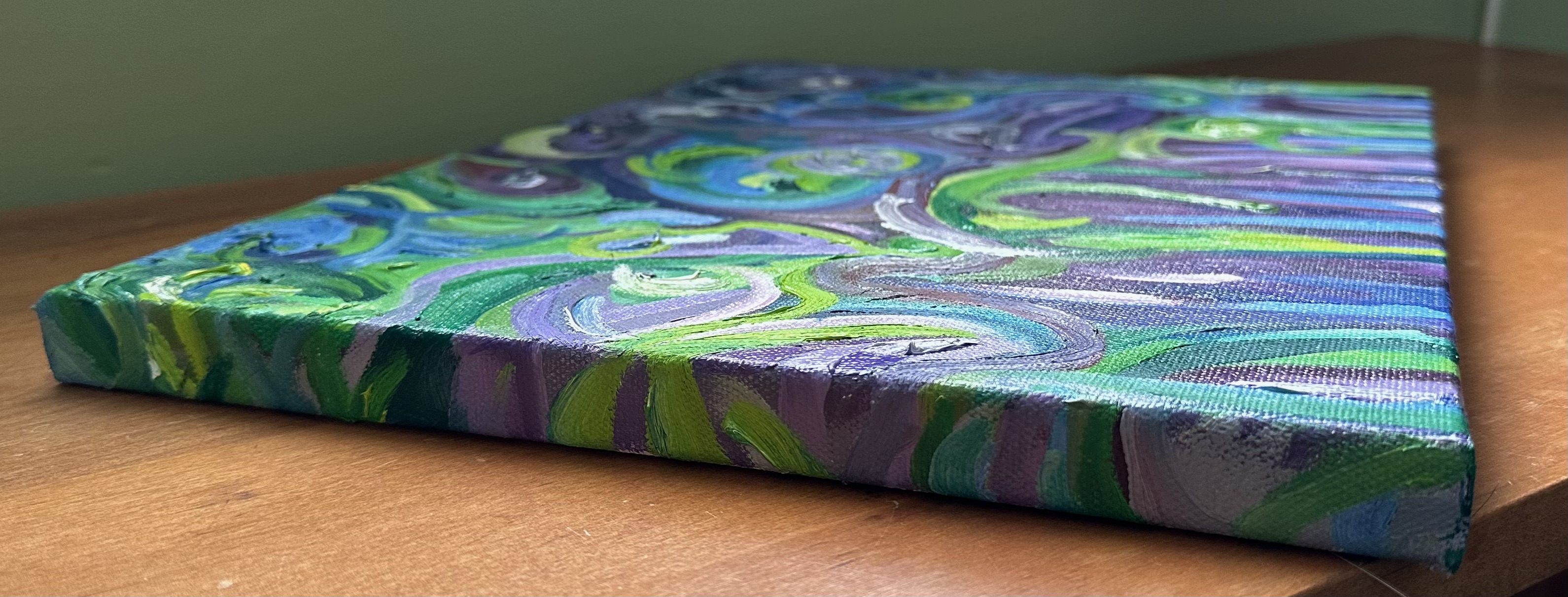 The left - lines and swirls of green, purple, blue, and white.