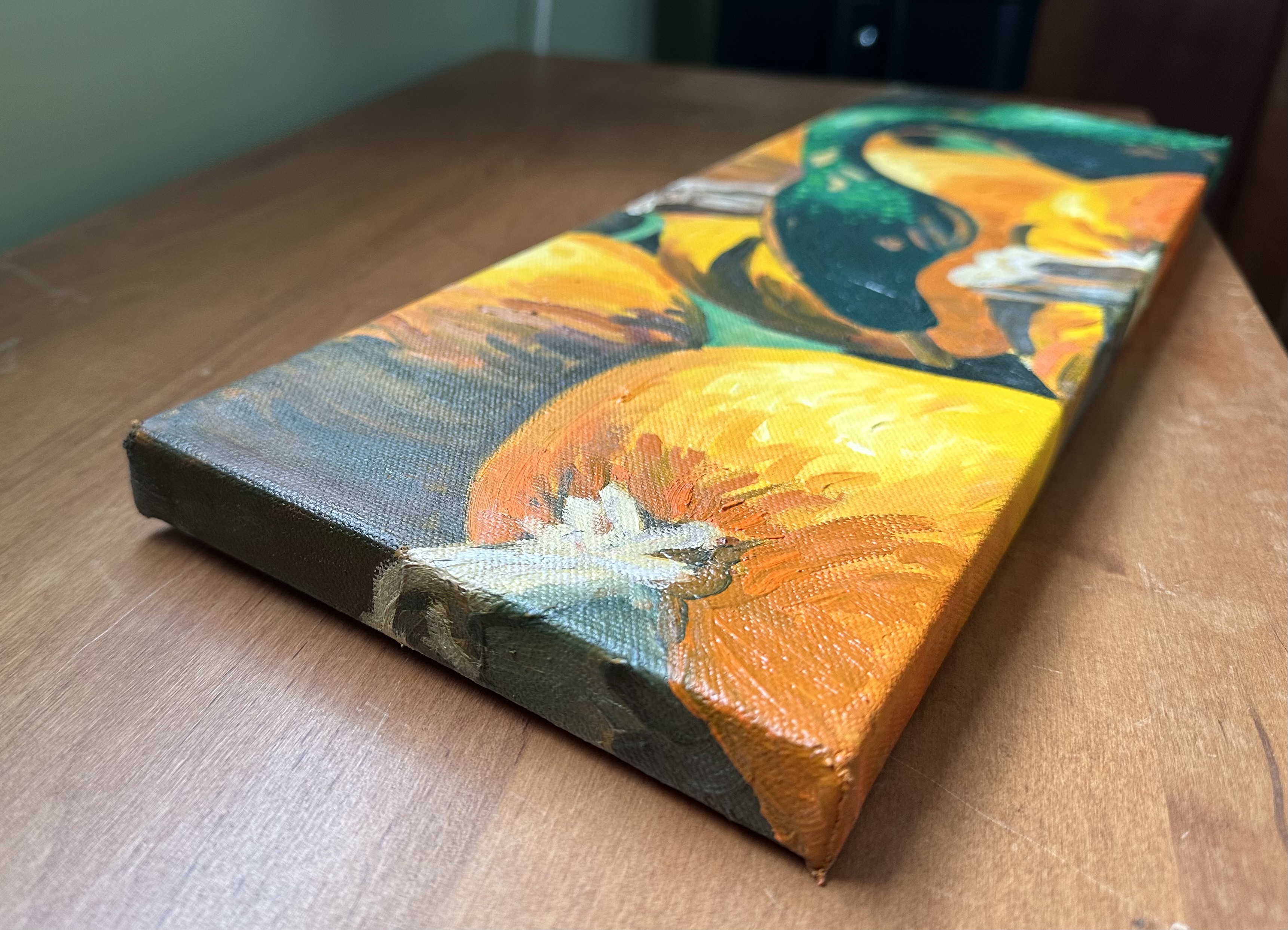 The left side of the painting with a view of the front. The left side shows more of a pumpkin stem with more pumpkin in shadow.