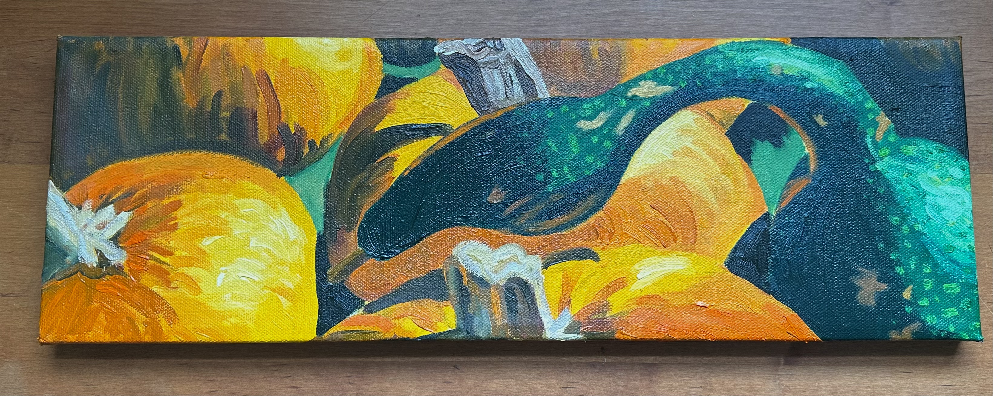 Looking at the front of the painting - there are 5 semi-visible orange pumpkins on the ground with a little green seen for the ground. On the right is a green gourd with a long stem that looks like a goose in form.