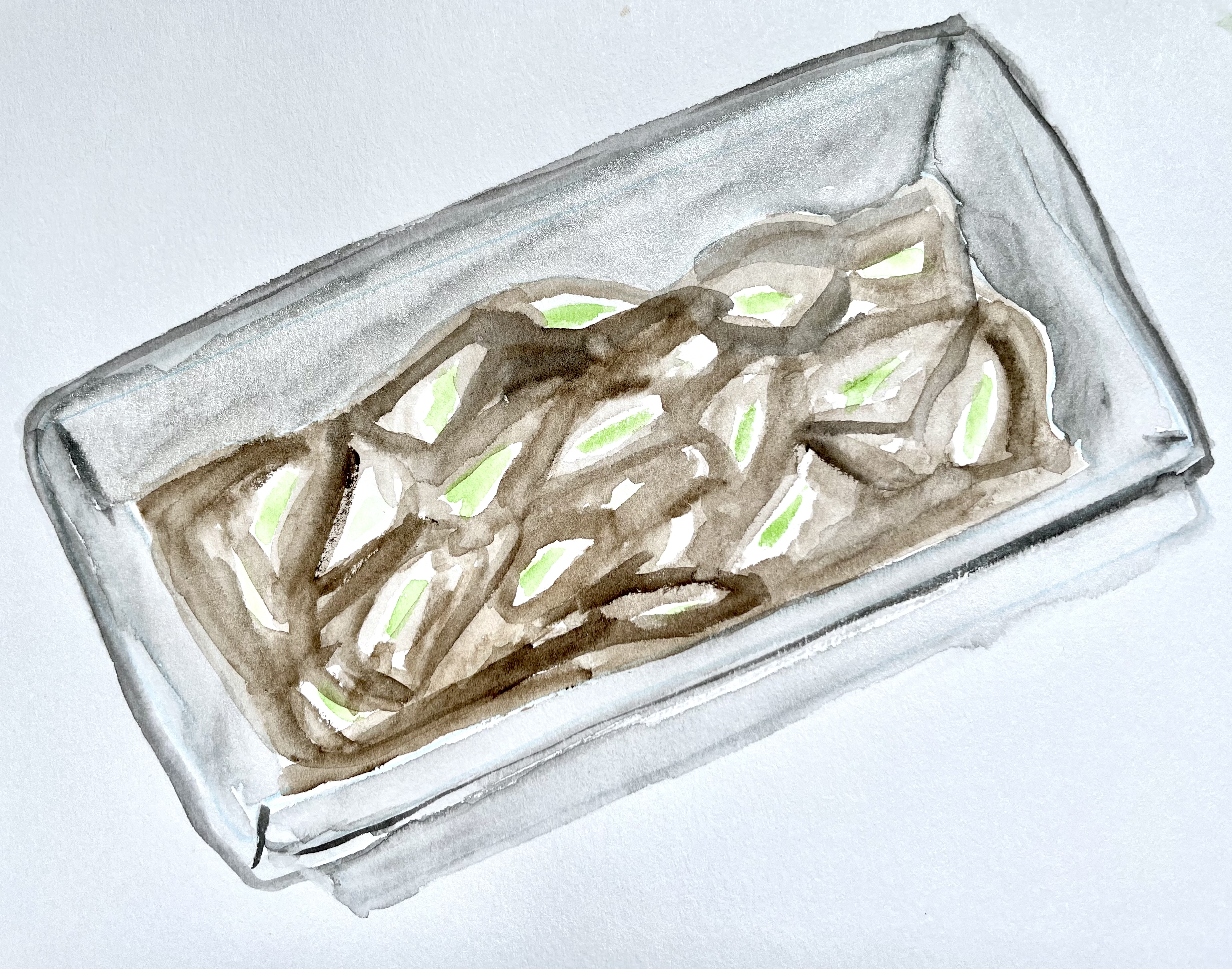 A watercolor illustration of a rectangular loaf tin with (what's supposed to be) the batter of the chocolate bread. It's brownish black lumpy with bits of green in it.